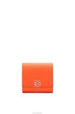 Loewe Women Anagram compact flap wallet in pebble grain calfskin 206XF1294 Orange