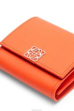 Loewe Women Anagram compact flap wallet in pebble grain calfskin 206XF1294 Orange - Image 5