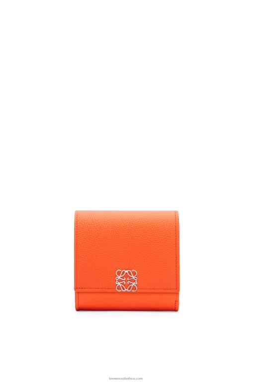 Loewe Women Anagram compact flap wallet in pebble grain calfskin 206XF1294 Orange - Image 1